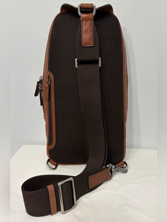 a leather backpack Parker Color:Ocean a dedicated key ring features:Gear Storage Coach Academy Leather Backpack